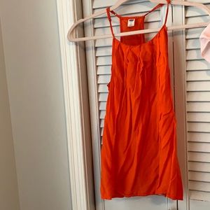 Bright orange blouse